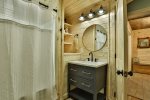 Terrace level shared bathroom with shower/tub combo
